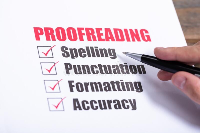 Checklist for proofreading with items like spelling, punctuation, formatting, and accuracy, being marked off with a pen.